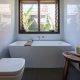 gloss white tiles bathroom
