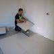 installing floor tiles